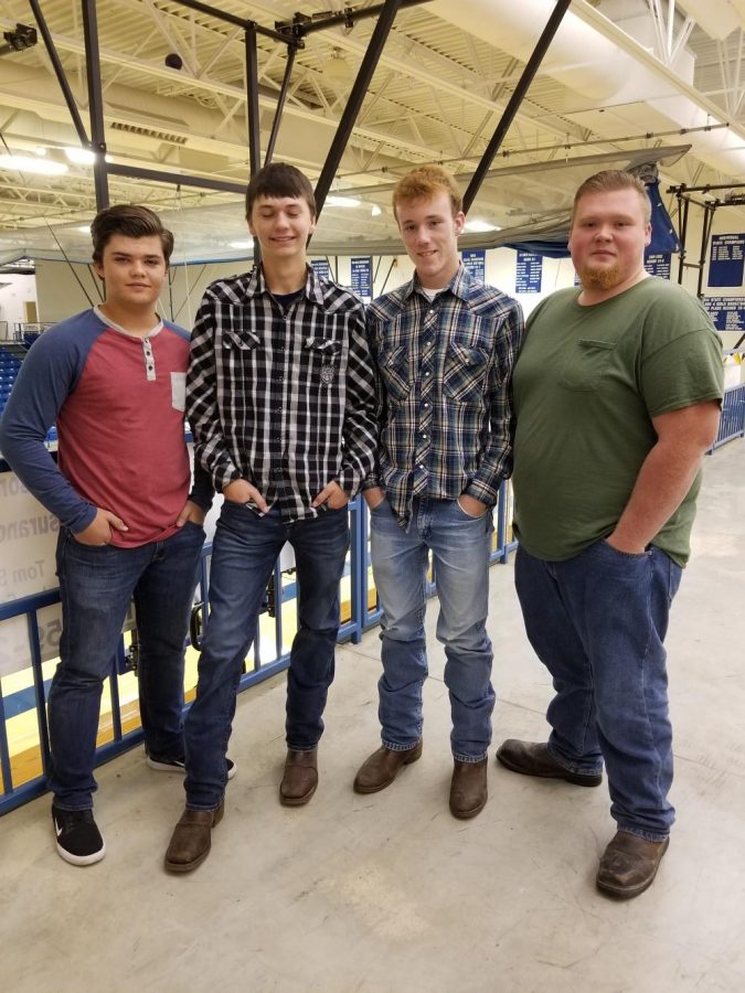 Marshfield High School students, (left to right) Ryan Mendes, Zach Dishman, Ira Cole Marlin, and Thomas Chaplin waited in line to retake their school picture.