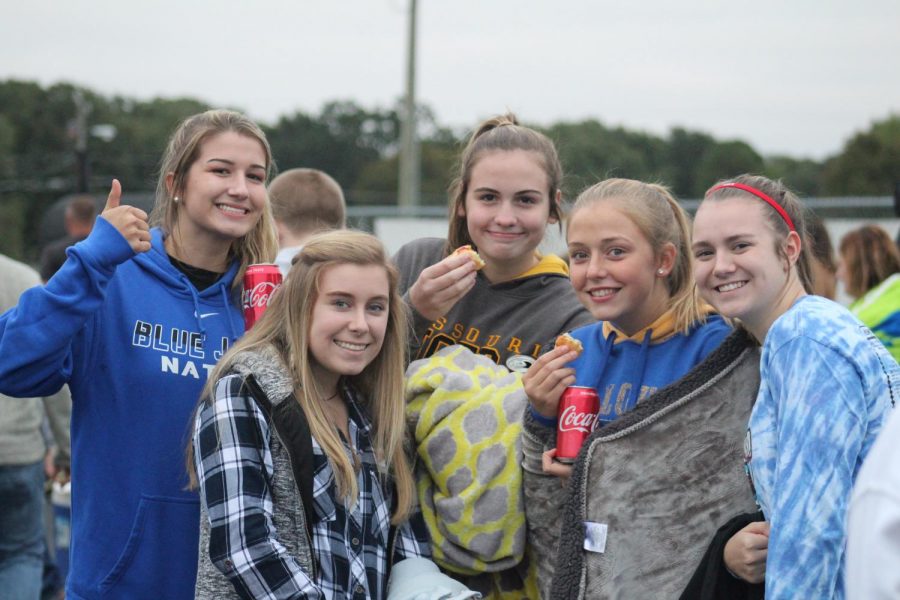Friends and family were able to eat food and be together at the tailgate before Fields of Faith