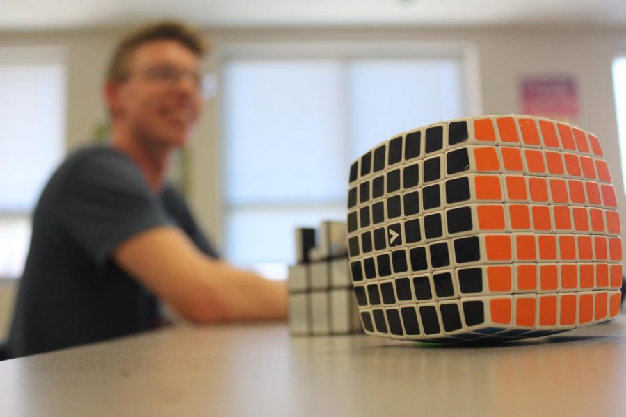 Senior Wyatt Greer solving the Rubik cube