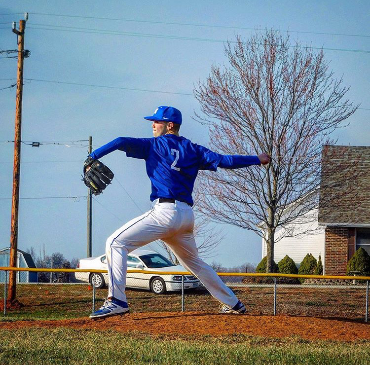 Truett Gardner pitching at home against Excelsor Spring HS 