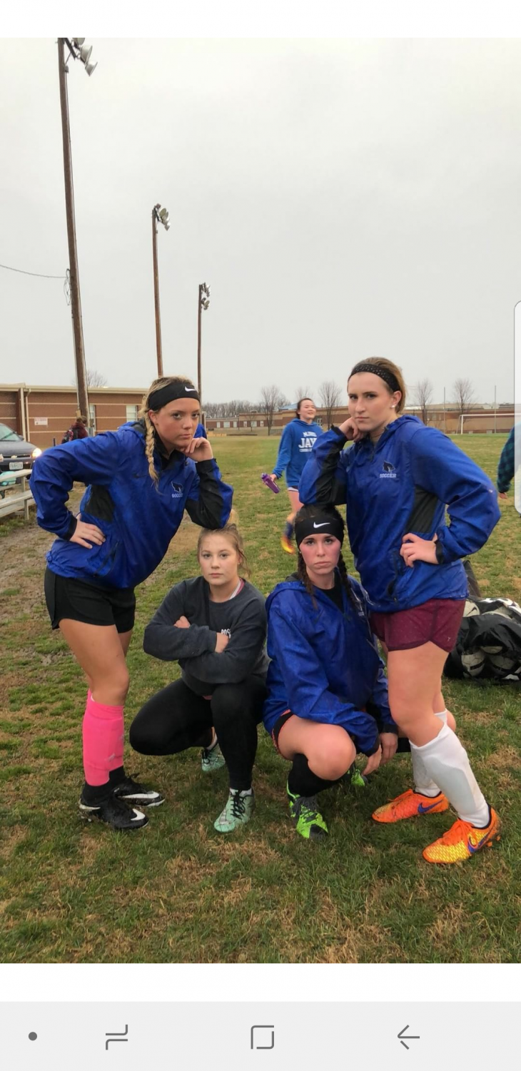 (Left to right) Senior Tori Bargewell, Dallas Hougardy, Brady VanNest, and Junior Shayden Porter, posing for a picture after the second day of practice.