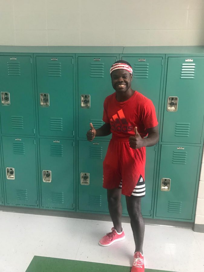 Senior, Jacobi Villines supporting Red and White day