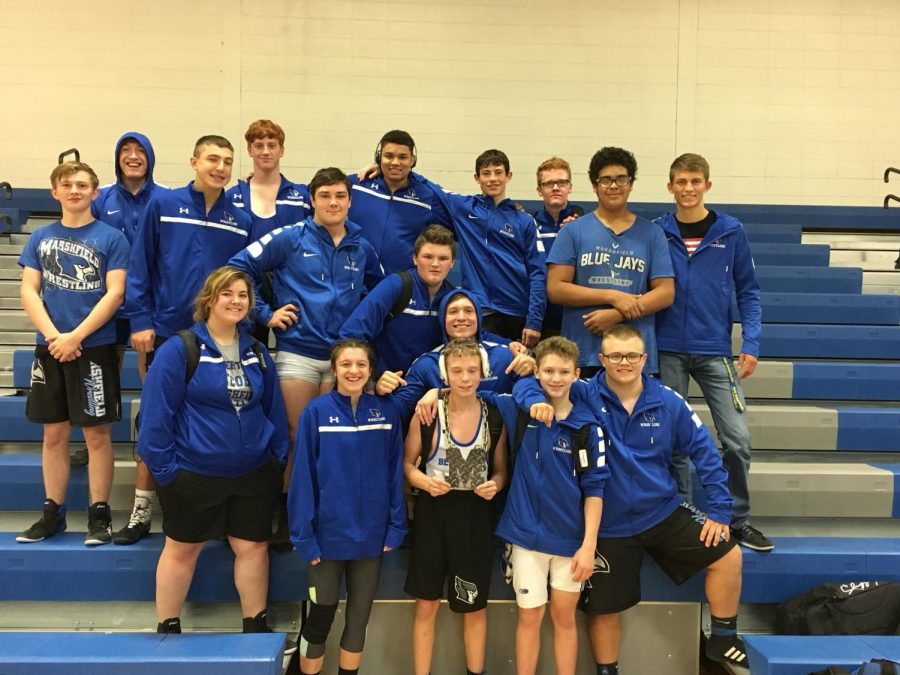 Marshfield Wrestlers pose for a photo during Blue and White