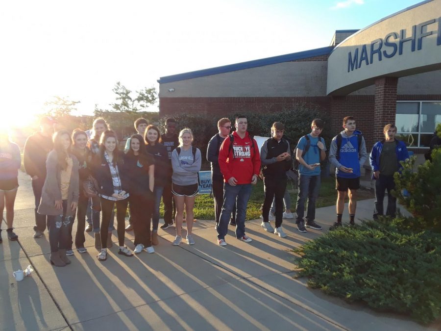 Students meet at the pole last school year for FCA.